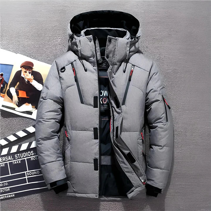 Herren Winterjacke | Wattierte Steppjacke mit verstellbarer Kapuze, Reißverschlusstaschen und sportlichem Schnitt für kalte Tage
