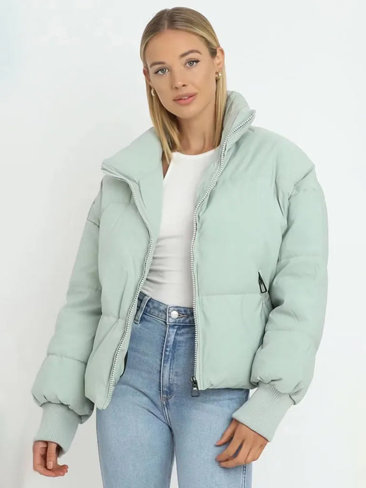 Damen Pufferjacke | Leichte Steppjacke mit tailliertem Schnitt, wärmender Fütterung und praktischen Taschen für Alltag und Freizeit
